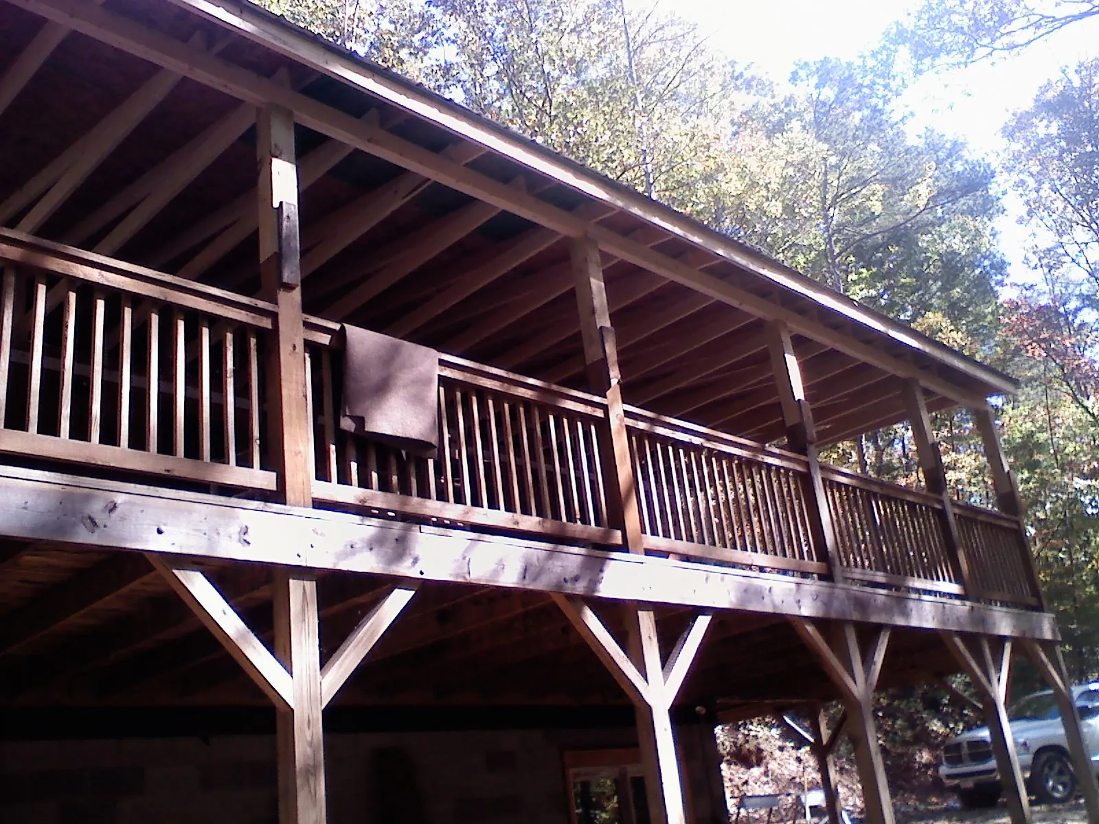 Timber framing under a new elevated porch and deck — Roof Leak Repair in Colchester by Roofing Brothers